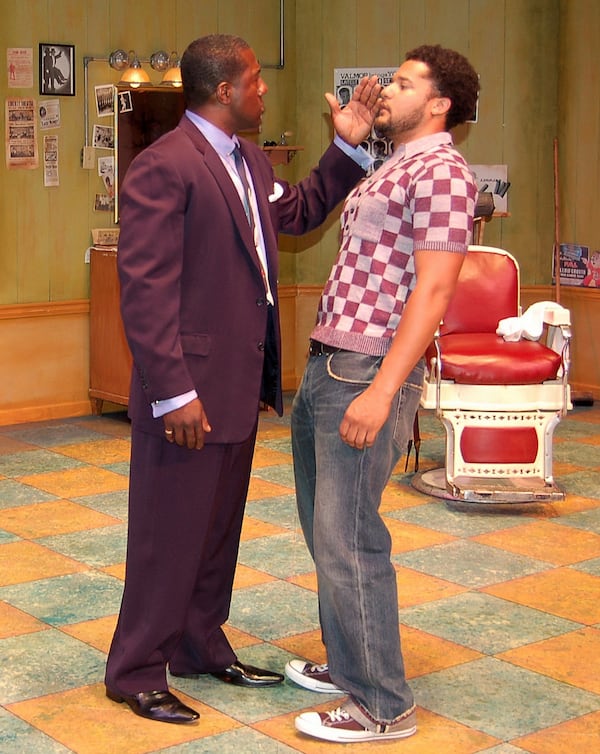 Blue (E. Roger Mitchell) threatens Theo (Brandon Dirden) in True Colors Theatre Company's production of "Ceremonies in Dark Old Men" in 2007. Photo courtesy of True Colors.