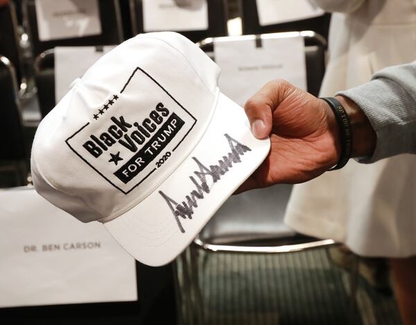 November 8, 2019 Atlanta: Attendee King Face has a autographed hat from President Donald Trump he received during the Black Voices for Trump Coalition Rollout on Friday, November 8, 2019, in Atlanta.   Curtis Compton/ccompton@ajc.com