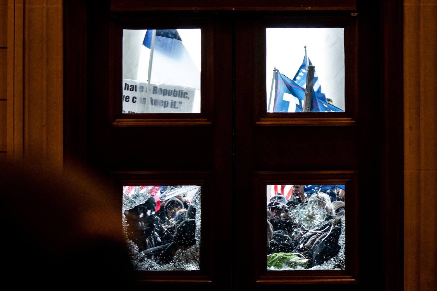 Pro-Trump protesters storm the Capitol in Washington, Wednesday, Jan. 6, 2021, on the same day as a joint session of Congress met to certify the electoral votes from the 2020 presidential election. (Erin Schaff/The New York Times)