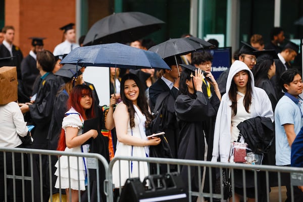 Emory students go through the security check-in for Emory University's 179th Commencement ceremony at Gas South Arena on Monday, May 13, 2024, in Duluth. (Miguel Martinez / AJC)