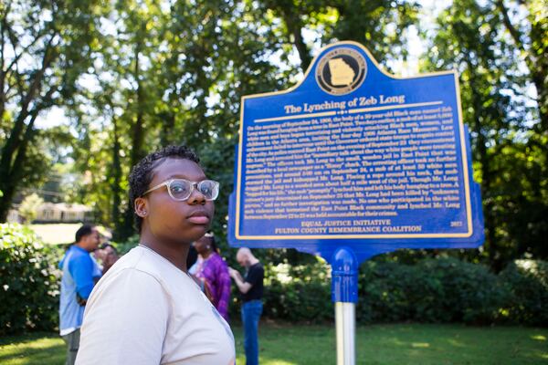 Jadori Smith attends the dedication ceremony for the historical marker for Zeb Long, a lynching victim from the 1906 Atlanta Race Massacre, on Saturday, September 24, 2022, at Sumner Park in East Point. "We need to know this history. But how many Zeb Longs are out there that we don’t know about?” CHRISTINA MATACOTTA FOR THE ATLANTA JOURNAL-CONSTITUTION