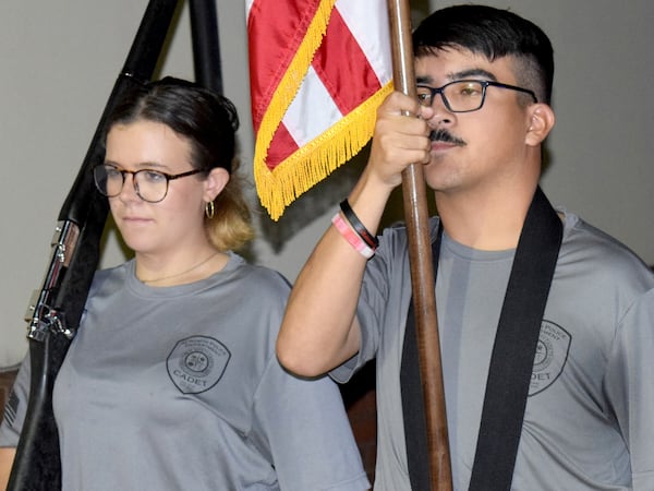 From 2023: Kirsten Combs (left) and Kamran Padilla practice drills during a recent Acworth police cadets meeting.