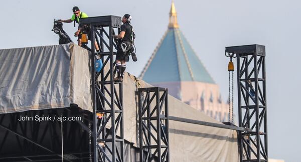 Crews assemble the stage for the Shaky Knees Music Festival, which is scheduled to begin Friday in the Old Fourth Ward's Central Park. If the weather holds, concertgoers can expect summertime temperatures and mainly dry conditions.