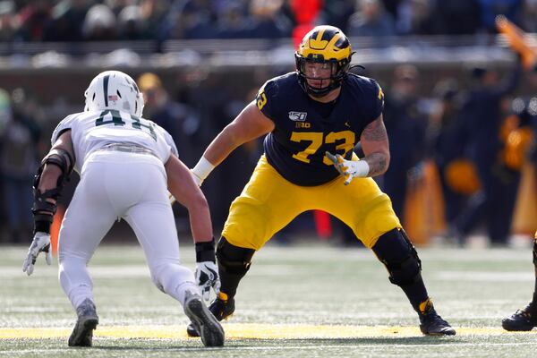 Michigan offensive lineman Jalen Mayfield (73) plays against Michigan State in the first half of an NCAA college football game in Ann Arbor, Mich., Saturday, Nov. 16, 2019. (AP Photo/Paul Sancya)