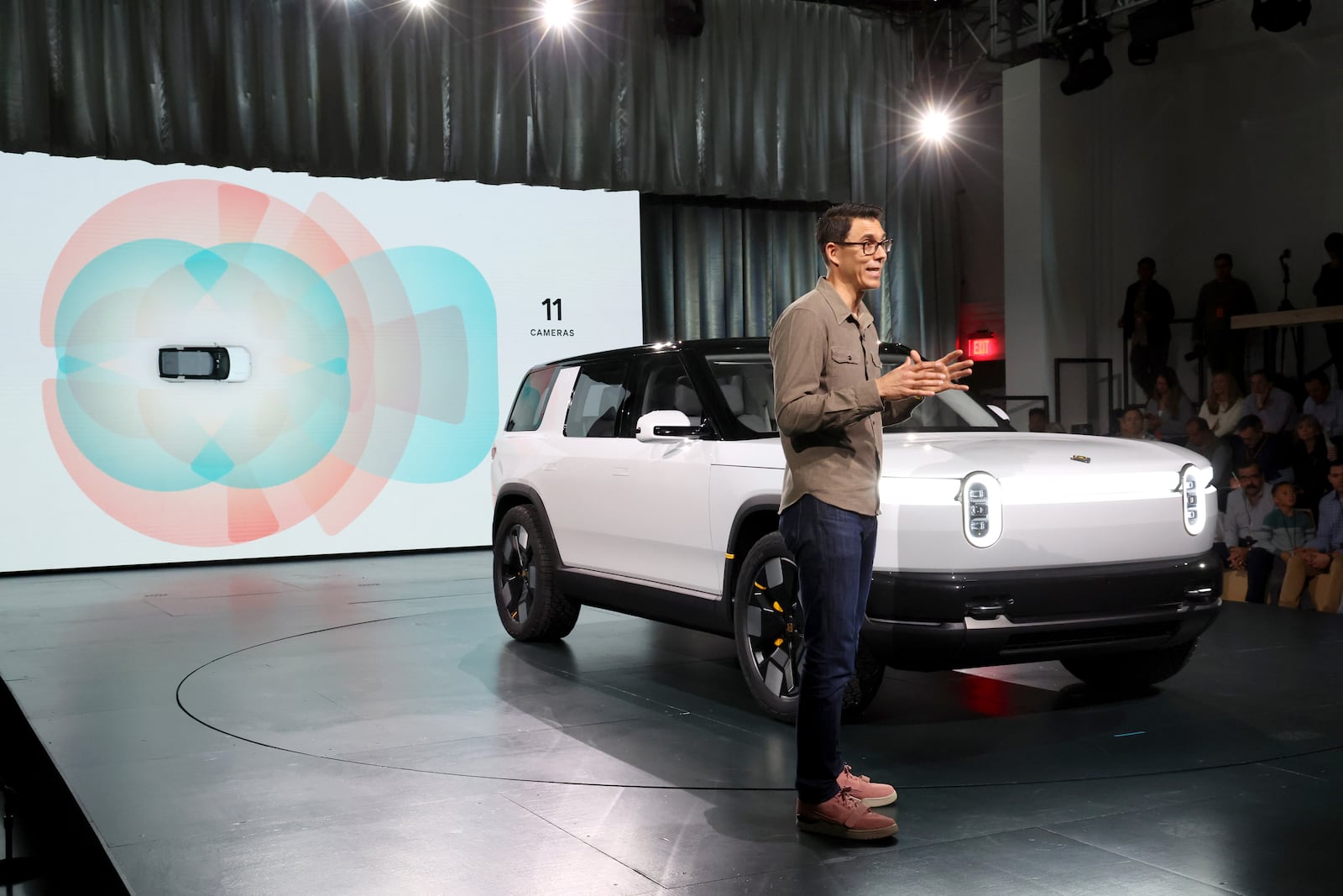 Founder and CEO of Rivian RJ Scaringe speaks onstage during the Rivian Reveals All-Electric R2 Midsize SUV event at Rivian South Coast Theater on March 07, 2024, in Laguna Beach, California. (Photo by Phillip Faraone/Getty Images for Rivian)