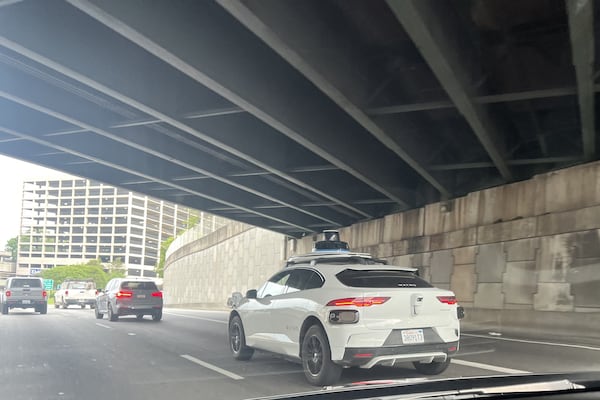 A Waymo vehicle on the Downtown Connector in Atlanta on Wednesday, April 17, 2024. (Kelly Yamanouchi/AJC)