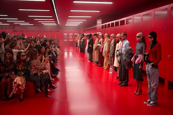 Models wear creations as part of the Valentino Fall/Winter 2025-2026 Womenswear collection presented in Paris, Sunday, March 9, 2025. (Photo by Scott A Garfitt/Invision/AP)