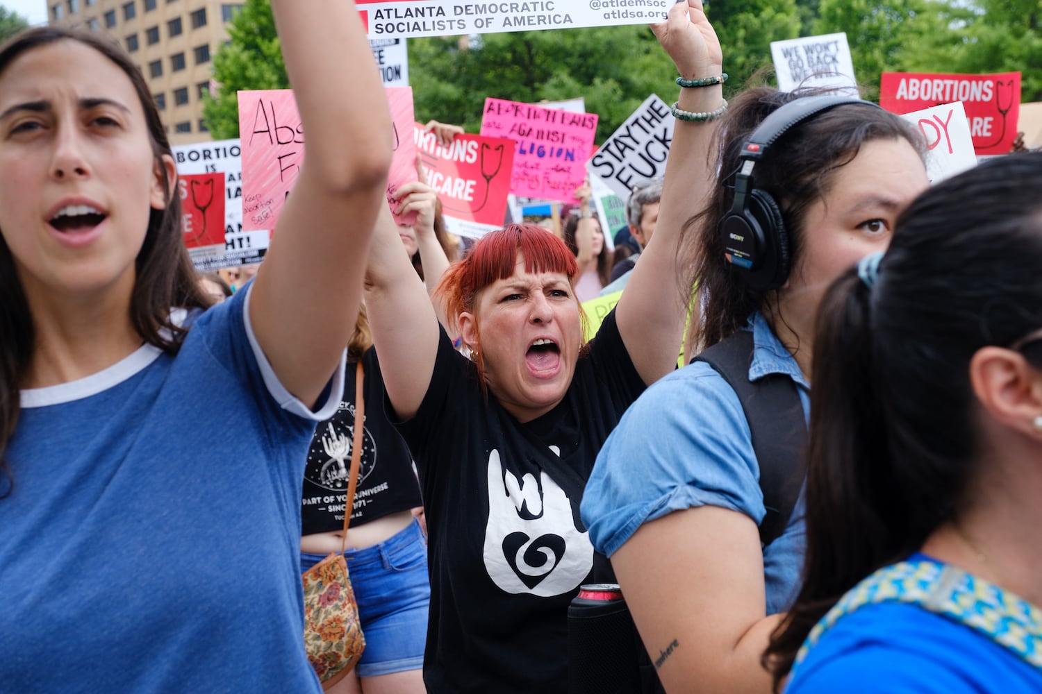 Heather Abramson (center) attends an abortion rights rally at the Georgia Capitol on Friday, June 24, 2022. The protest follows the Supreme Court’s overturning of Roe v Wade. (Arvin Temkar / arvin.temkar@ajc.com)