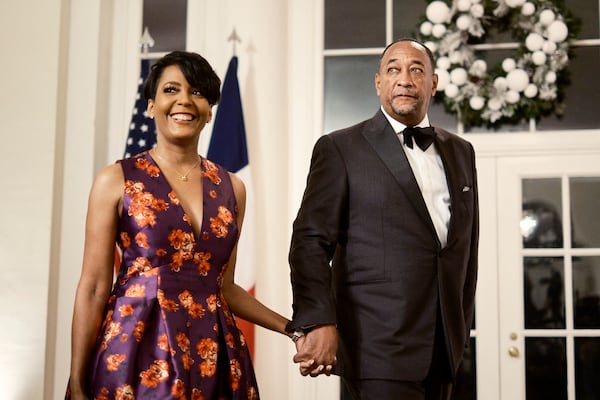 Keisha Lance Bottoms, the former mayor of Atlanta, and Derek Bottoms arrive for a state dinner during the visit of President Emmanuel Macron of France, at the White House in Washington on Thursday, Dec.1, 2022. (T.J. Kirkpatrick/The New York Times)