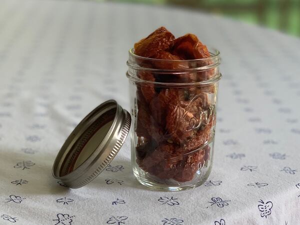 Your oven-dried tomatoes will keep in an airtight, refrigerated jar for a week, but you can preserve them for up to six months by topping off the jar with heart-healthy olive oil. CONTRIBUTED BY KELLIE HYNES