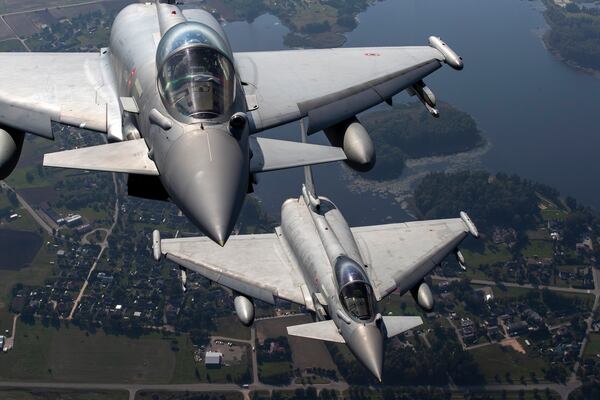 FILE - Italian Air Force Eurofighter Typhoon military fighter jets participate in NATO's Baltic Air Policing Mission operate in Lithuanian airspace, on Sept.12, 2023. (AP Photo/Mindaugas Kulbis, File)