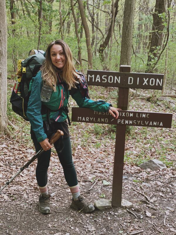 Cassidy "Nova" Bridges pasues on her hike from Georgia to Maine at the former border between the North and the South. CONTRIBUTED: CASSIDY BRIDGES