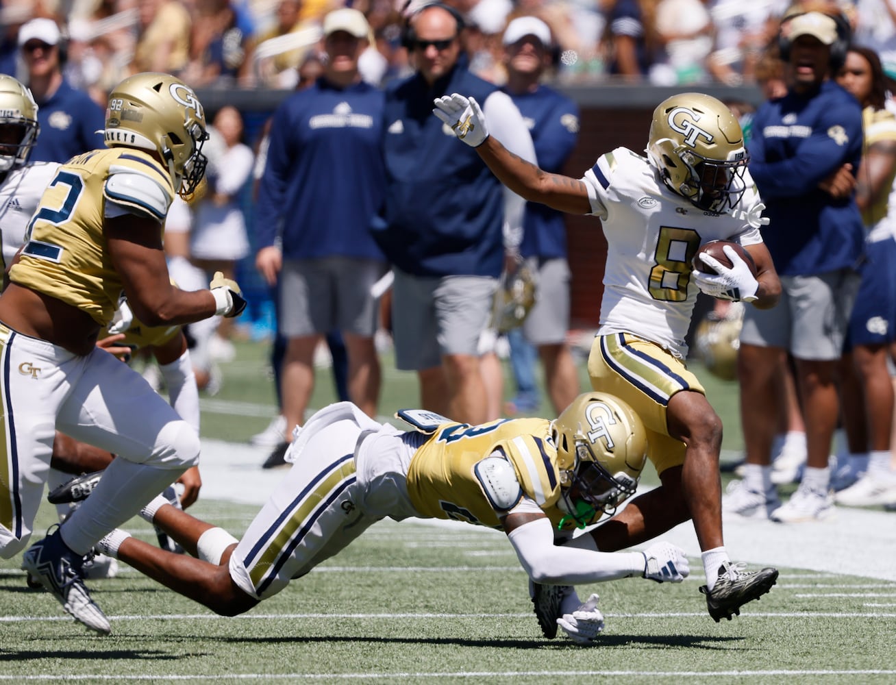 Georgia Tech wide receiver Malik Rutherford (8) extends a pass play as Georgia Tech Georgia Tech defensive back Khari Gee (23) defends during the Spring White and Gold game at Bobby Dodd Stadium at Hyundai Field In Atlanta on Saturday, April 13, 2024.   (Bob Andres for the Atlanta Journal Constitution)