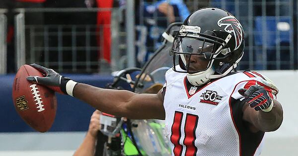 102515 NASHVILLE: -- GAME WINNER — Falcons wide receiver Julio Jones celebrates his game winning touchdown for a 10-7 victory over the Titans in a football game on Sunday, Oct. 25, 2015, in Nashville. Curtis Compton / ccompton@ajc.com