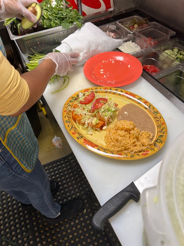 The enchiladas at Cocina de la Tia are filled with cheese and made with fresh tortillas.