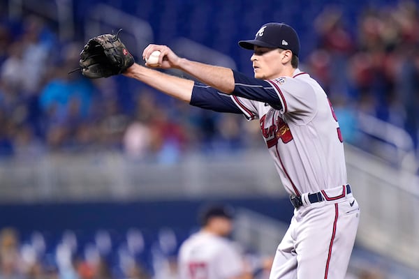 Atlanta Braves starting pitcher Max Fried stretches on the mound after giving up a double to Miami Marlins' Adam Duvall during the first inning of a baseball game, Saturday, July 10, 2021, in Miami. (AP Photo/Lynne Sladky)