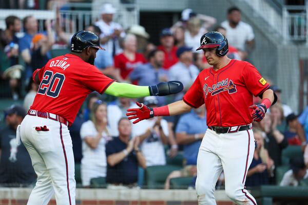 Atlanta Braves third baseman Austin Riley, right, celebrates his two-run home run with Atlanta Braves designated hitter Marcell Ozuna during the second inning against the Tampa Bay Rays at Truist Park, Friday, June 14, 2024, in Atlanta. (Jason Getz / AJC)
