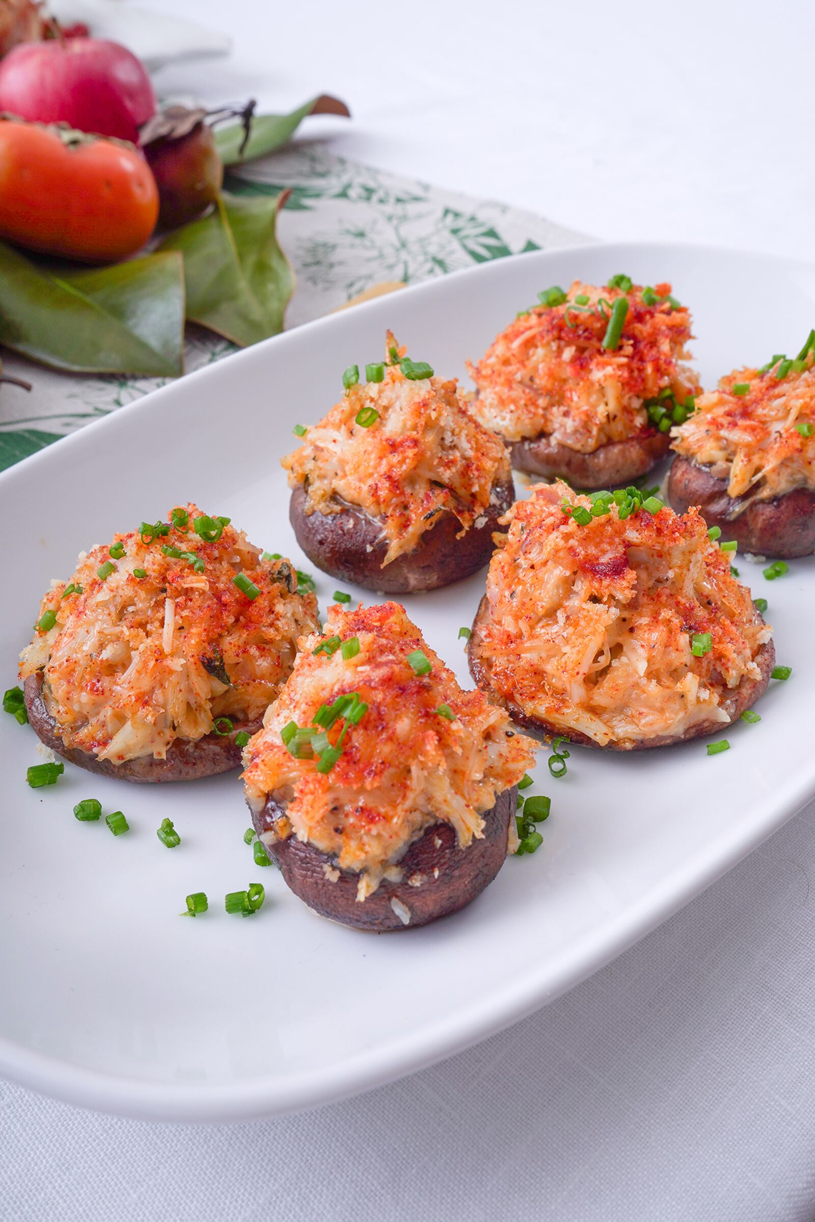 Lower priced lump crabmeat is the focal point in these simple, but luxe stuffed mushroom starters. Touches of lemon pepper, salty Parmesan cheese and panko breadcrumbs amplify the flavor and add some lovely crunch. (Chadwick Boyd for The Atlanta Journal-Constitution)