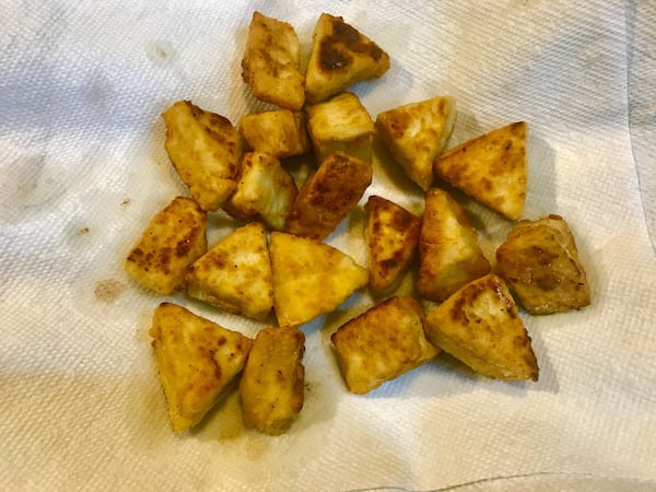 If you’re worried about family members who might not like tofu, frying it for Sweet and Sour Tofu will help get them to try it. LIGAYA FIGUERAS / LIGAYA.FIGUERAS@AJC.COM