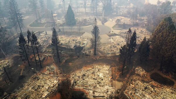 An aerial view of a neighborhood destroyed by the Camp Fire on November 15, 2018 in Paradise, California. A bus driver safely evacuated students from an elementary school in the town Nov. 18.