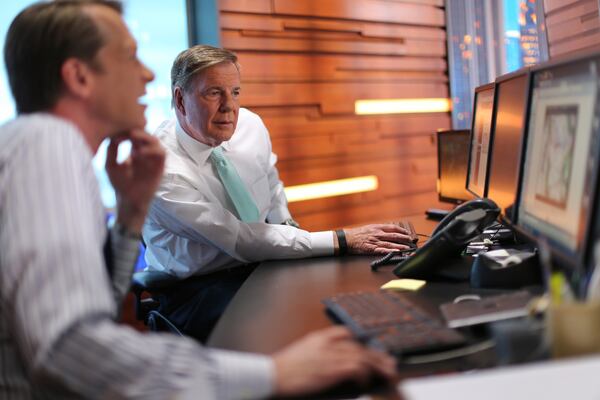 Glenn Burns, right, with colleague Brad Nitz, has returned to Channel 2 Action News. AJC photo/Ben Gray