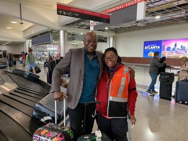 Lewis Thompson (left) met his niece Syreeta Kirkland- Willis (right) for the first time in December 2022 during a visit to his family in Georgia. Kirkland-Willis, who works as gate agent at Hartsfield-Jackson International Airport, was the first family member to see Thompson in person. Credit: Anthony Black