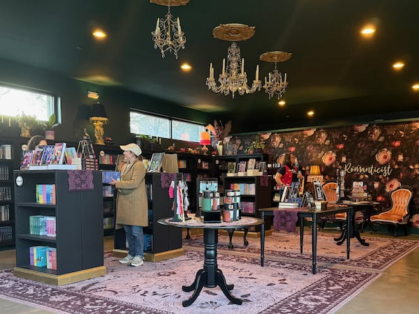 The interior of All the Tropes Romance Bookstore in Kirkwood strikes a darkly romantic vibe. Danielle Charbonneau/dcharbonneau@ajc.com