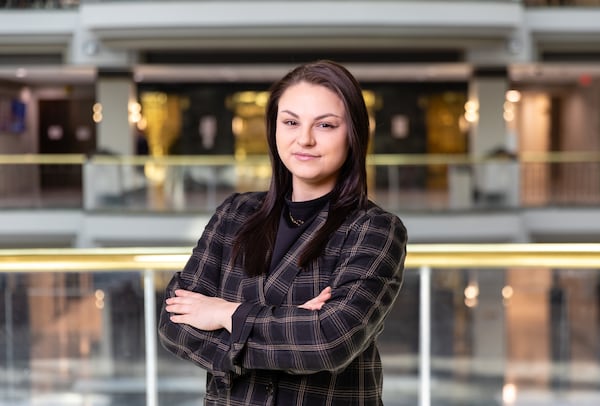 Atlanta Journal-Constitution reporter Riley Bunch poses for a portrait at City Hall in Atlanta on Monday, February 24, 2025. (Arvin Temkar / AJC)