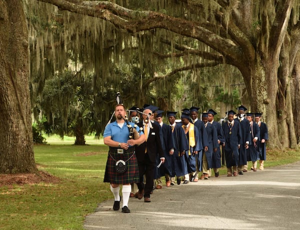 Bethesda Academy graduates maintained an honored tradition as, led by a bagpiper, they remembered their time with a "Reflection Walk" around campus.