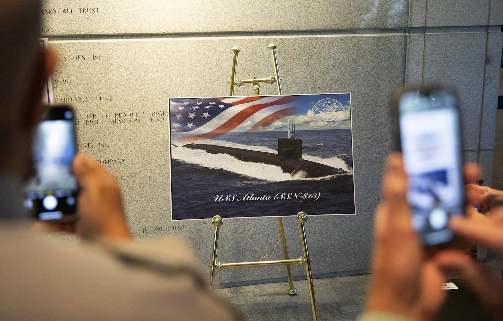 U.S. Secretary of the Navy Carlos Del Toro announces the branch's newest Virginia-class nuclear-powered submarine will be named the "U.S.S. Atlanta" during a ceremony at the Jimmy Carter Presidential Library and Museum on Oct. 23, 2024.