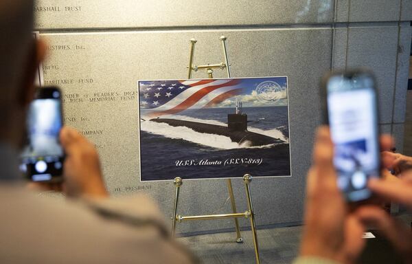 U.S. Secretary of the Navy Carlos Del Toro announces the branch's newest Virginia-class nuclear-powered submarine will be named the USS Atlanta during a ceremony at the Jimmy Carter Presidential Library and Museum on Oct. 23, 2024. Riley Bunch/AJC