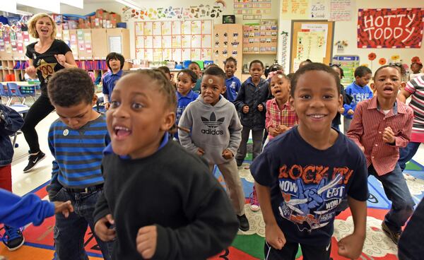 Kindergartners get into recess. HYOSUB SHIN / HSHIN@AJC.COM