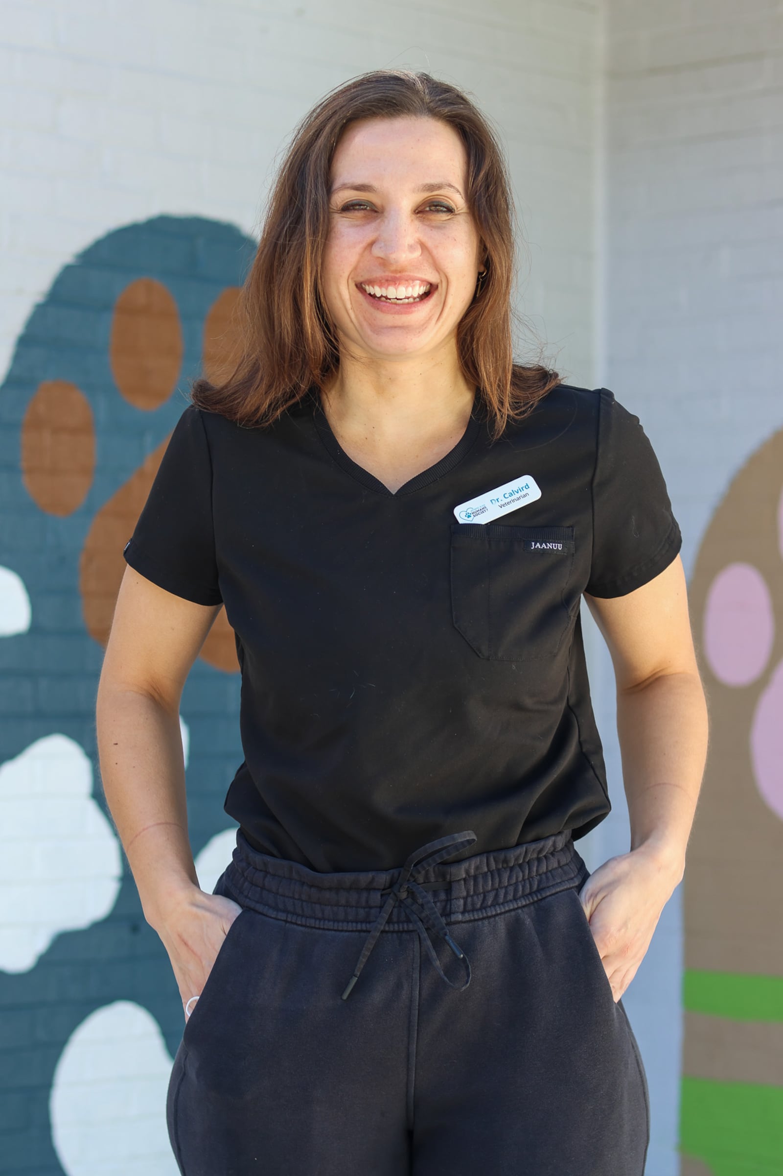 Dr. Amanda Calvird, 31,  poses for a portrait during her workday as a veterinarian at the Athens Area Humane Society, where she routinely provides affordable surgeries, wellness checks and emergency care for the Athens area and partnering shelters on Wednesday, Nov. 1, 2023 in Athens, Georgia. (Photo Courtesy of Samantha Hurley)