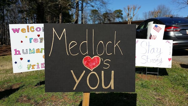  Signs created by neighbors in the Medlock area of DeKalb and set up outside ICS ought to reassure students they were supported.