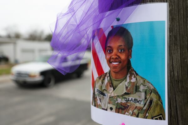 A photograph of Army Reservist Sgt. Kennedy L. Sanders is shown on a pole on Ossie Davis Parkway on Friday, Feb. 16, 2024, in Waycross, Georgia. Sanders was killed in a drone attack in January in Jordan. (Jason Getz/jason.getz@ajc.com)