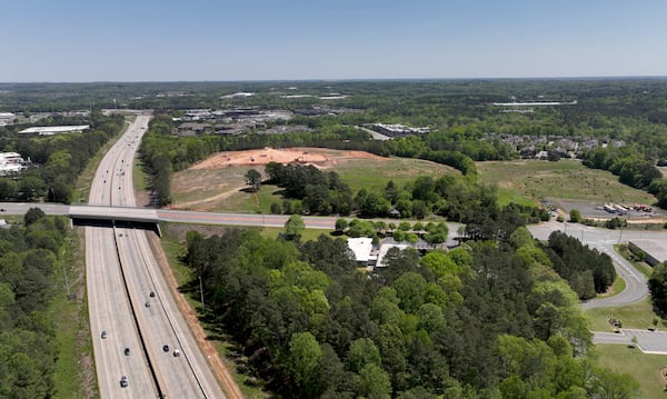 Aerial photograph shows land in Forsyth County for a proposed mixed-use development and arena with the goal of bringing a NHL franchise back to metro Atlanta, along Ga. 400 (left), Tuesday, April 18, 2023, just north of Alpharetta.  (Hyosub Shin / Hyosub.Shin@ajc.com) 