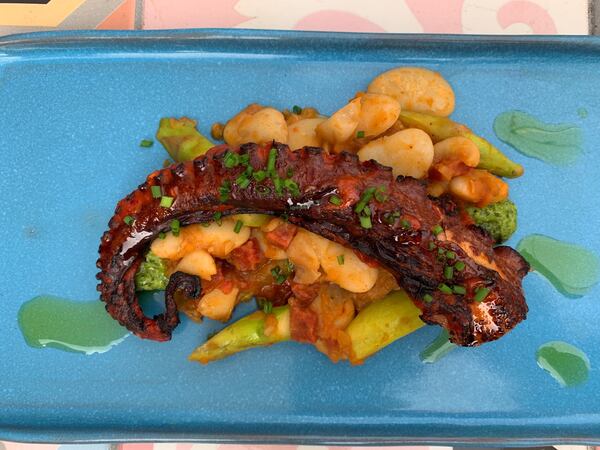 Escabeche, or steamed octopus with sauce, pickled fennel, fried quinoa and fried garlic, is a favorite dish at Buena Vida Tapas & Sol.  Photographer: Grady McGill