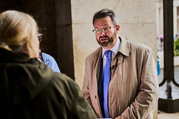 FILE -- Canon lawyer and professor at Catholic University of America in Washington DC, Kurt Martens talks with The Associated Press near St. Peter's Square in Rome, Wednesday, March 12, 2025. (AP Photo/Francisco Seco, File)