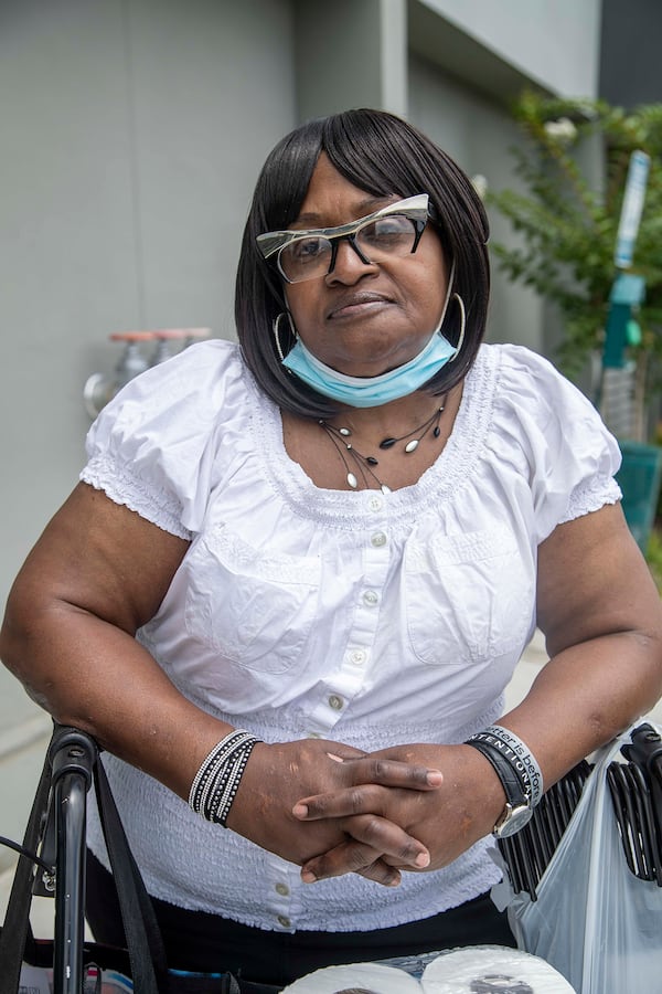 Constance E. Clemons, 67, is seen here outside the Wheat Street Towers Retirement Apartments in Atlanta’s Sweet Auburn District community on Monday, July 6, 2020. Clemons has been affected by the partying that takes place on weekends in Sweet Auburn. (ALYSSA POINTER / Alyssa.Pointer@AJC.com)