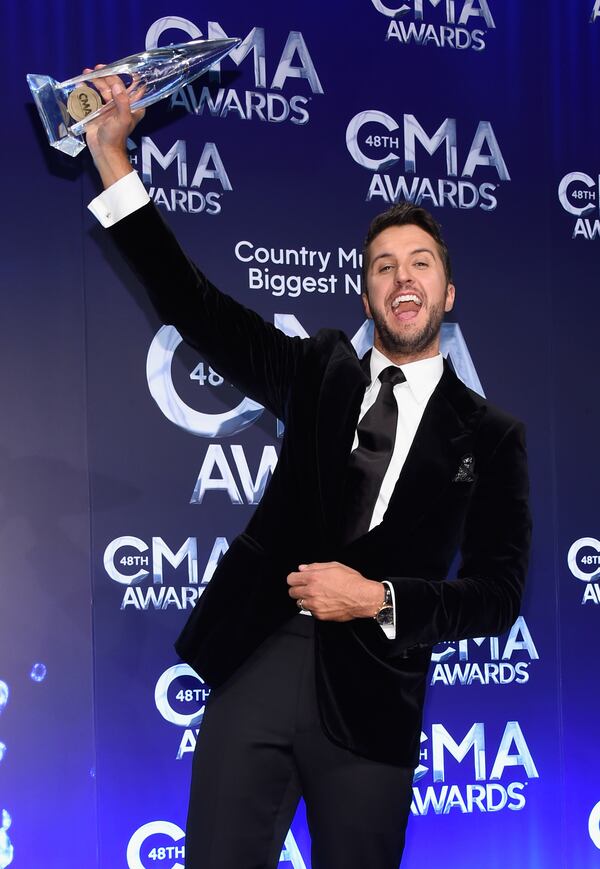 NASHVILLE, TN - NOVEMBER 05: Luke Bryan poses in the press room with his award for Entertainer of the Year during the 48th annual CMA awards at the Bridgestone Arena on November 5, 2014 in Nashville, Tennessee. (Photo by Larry Busacca/Getty Images) Ladies and gentleman, straight out of Leesburg, your entertainer of the year, Luke Bryan! Photo: Getty Images