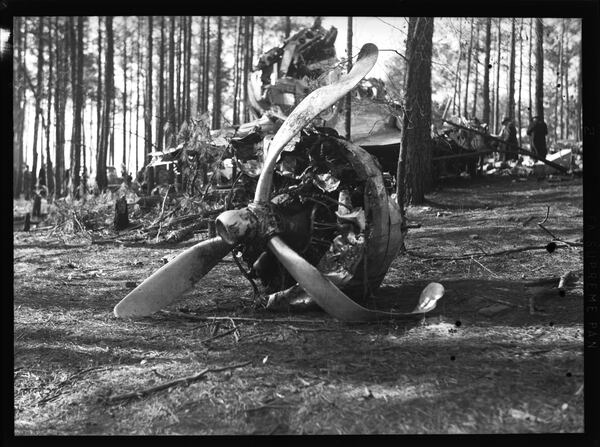 Amateur photographer David Lennox used an illegal police radio to keep up with accidents and disasters, putting him on the scene when Eastern Airlines Flight 21 crashed while preparing to land at Candler Field on Feb 26, 1941. Eight were killed. Among the injured was the airline's president, Eddie Rickenbacker. Photo: David Lennox