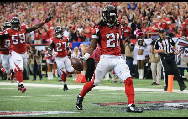 Desmond Trufant finishing off his 24-yard touchdown run after he recovered a fumble against the Texans. (Curtis Compton/The Atlanta Journal-Constitution)