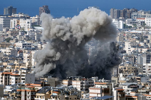 Smoke rises after an Israeli airstrike on Dahiyeh, in the southern suburb of Beirut, Lebanon, Thursday, Nov. 21, 2024. (AP Photo/Bilal Hussein)