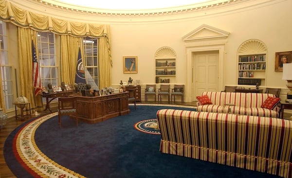 FILE - A replica of the Oval Office as it appeared during the Clinton administration is displayed at the Clinton Presidential Library in Little Rock, Ark., Nov. 17, 2004. (AP Photo/Danny Johnston, File)