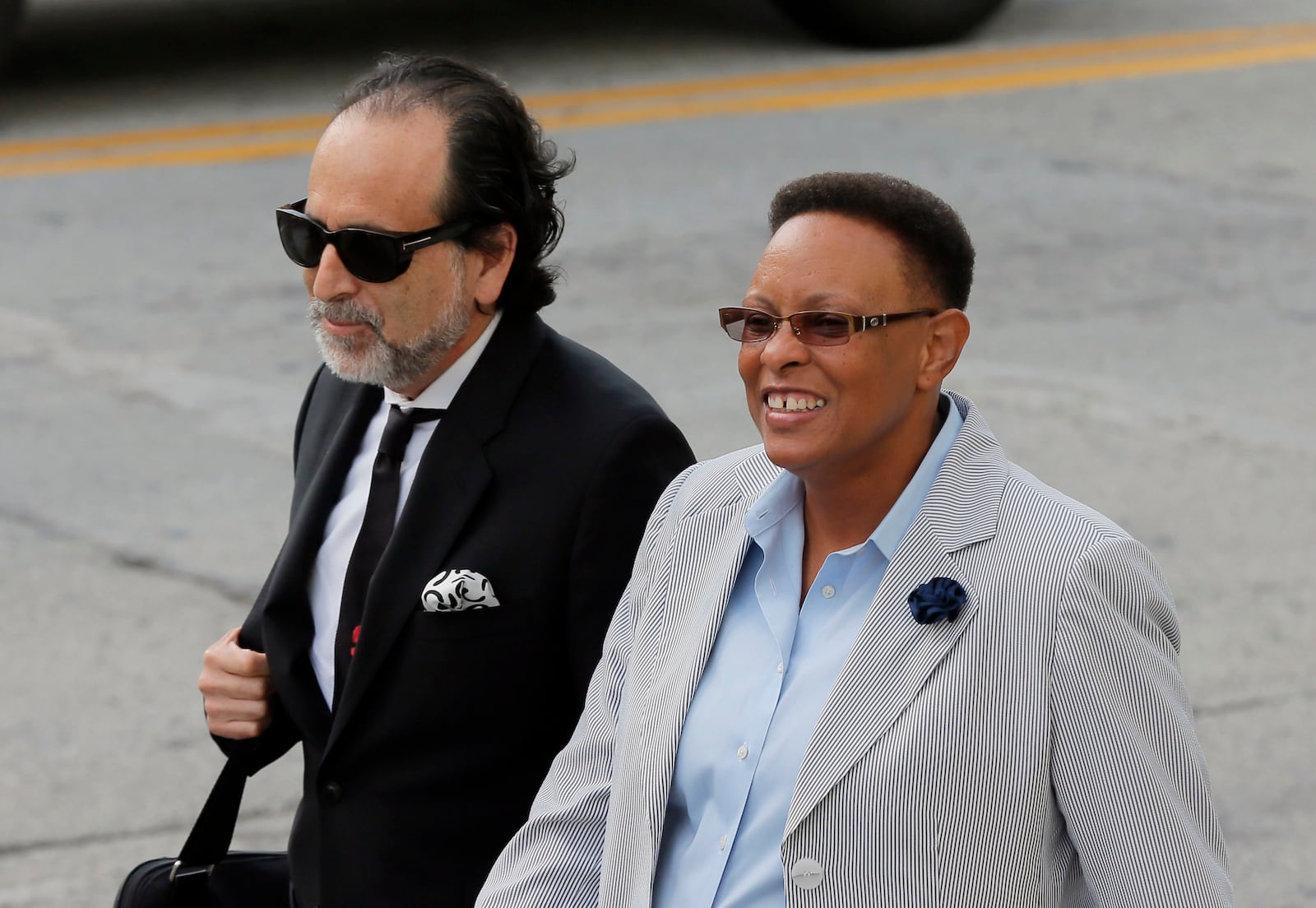 Mitzi Bickers, who served as Mayor Kasim Reed’s director of human services and is seen here with attorney Drew Findling, waived her appearance Monday on a charge of conspiracy to commit bribery related to contracts she sought in Jackson, Miss., in 2014 and 2015. BOB ANDRES /BANDRES@AJC.COM