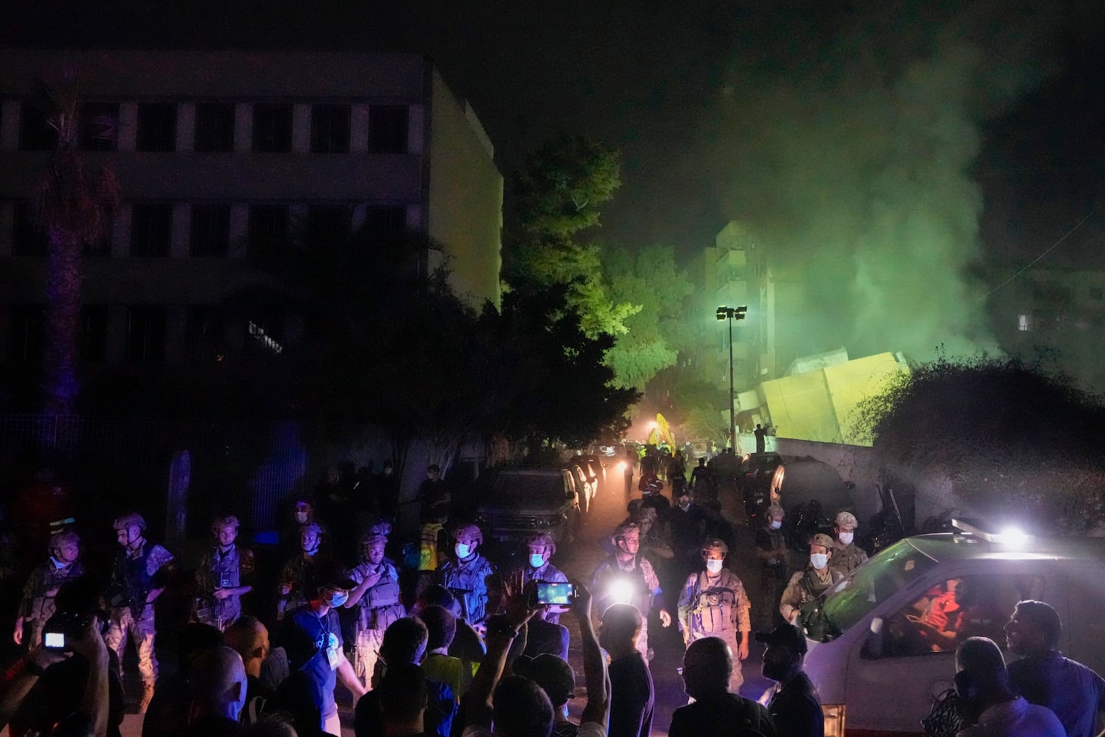 FILE - Lebanese soldiers secure the area at the site of an Israeli airstrike in Beirut's southern suburbs on Sept. 27, 2024. (AP Photo/Bilal Hussein, File)