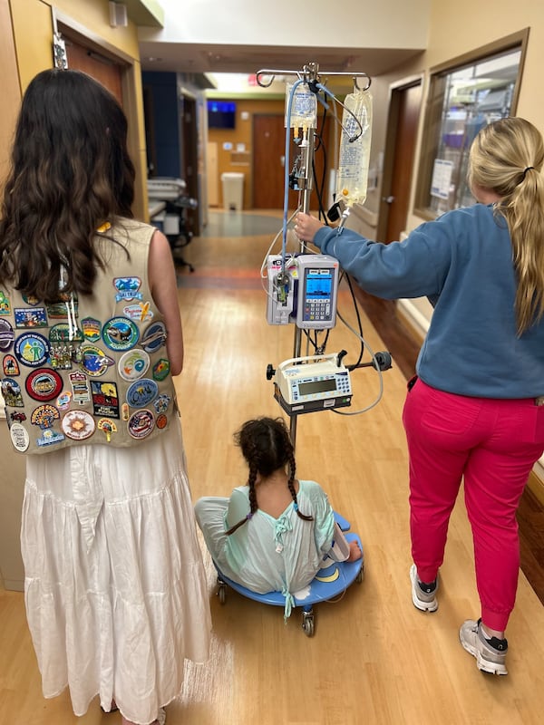 Sarah Gruber donated 17 handmade IV lily pads to the Spence and Becky Wilson Baptist Children's Hospital in Memphis, Tennessee. The skateboard-like devices attach to IV poles, allowing pediatric patients to sit and move around a hospital more efficiently while still connected to their IVs. (Courtesy of Baptist Memorial Health Care)