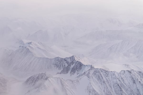 Snow covers the mountains of the Brooks Range in the Arctic National Wildlife Refuge, Monday, Oct. 14, 2024, near Kaktovik, Alaska. (AP Photo/Lindsey Wasson)