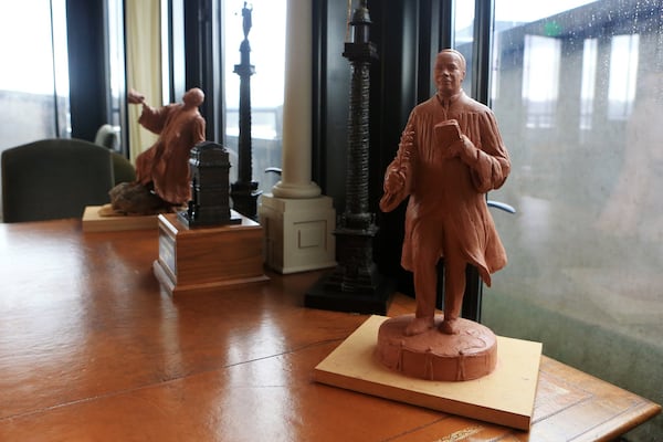 Two clay models of a possible bronze statue memorializing the Rev. Martin Luther King Jr. on display inside the Millennium Gate, home of the National Monuments Foundation . The gate’s construction was funded by Rodney Cook Jr., founder of the National Monuments Foundation, who is trying to raise money for a number of monuments to Georgia-connected peacemakers in an Atlanta park named after his father. (Christina Matacotta, for The Atlanta Journal-Constitution).