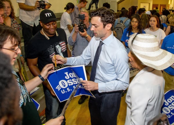 Jon Ossoff , Democratic candidate for one of Georgia's U.S. Senate seats, signs autographs during a  voter registration rally at the MLK Recreation Center in Atlanta on  Saturday, September 28, 2019. (Photo: STEVE SCHAEFER / SPECIAL TO THE AJC)